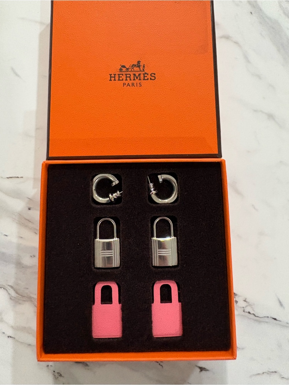 Hermès O’Kelley silver/ pink padlock earrings